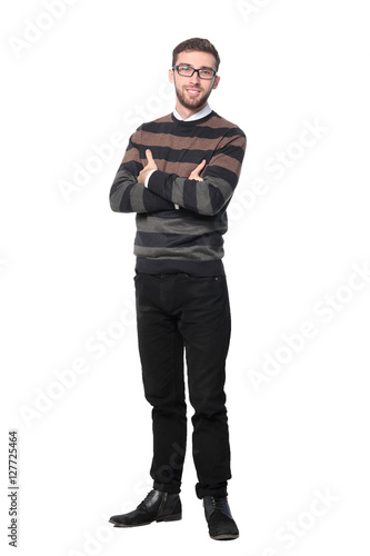 Full length of a business man with crossed arms isolated on whit