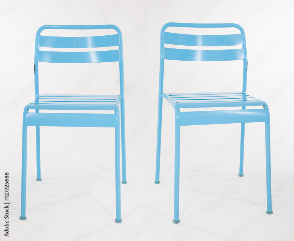 Turquoise metal chairs on white Turquoise metal chairs on white