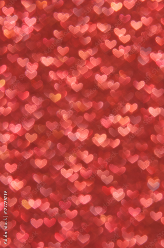 defocused abstract red hearts light background