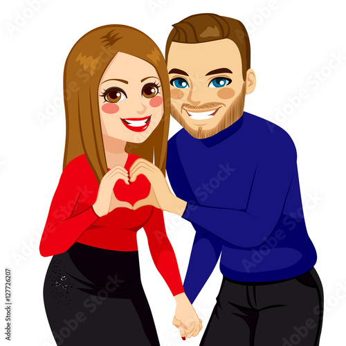 Happy young lovers couple making heart love sign with hands together