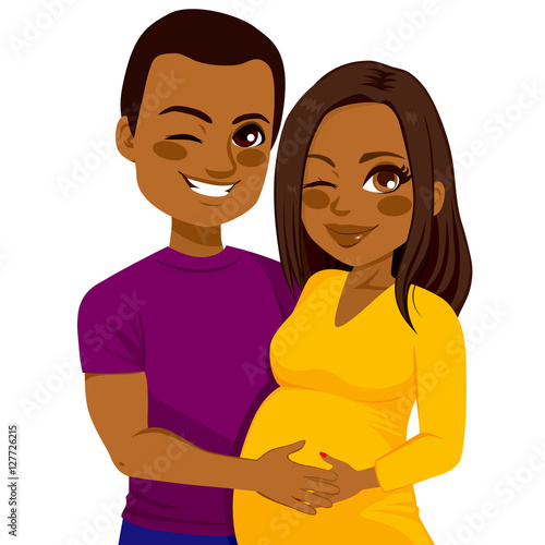 Young African American couple of man touching his pregnant wife belly expecting baby