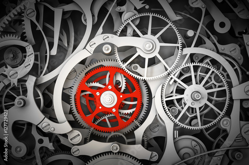 Photos Mechanism, clockwork with one different, red cogwheel.