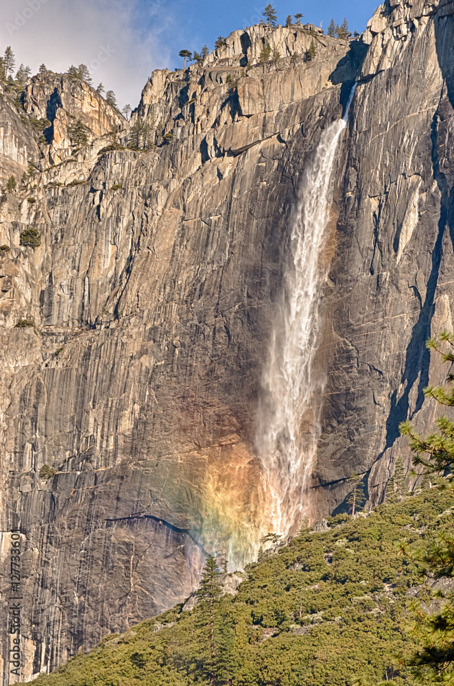 Early morning sun create a rainbow on Upper Yosemite Falls Early morning sun create a rainbow on Upper Yosemite Falls