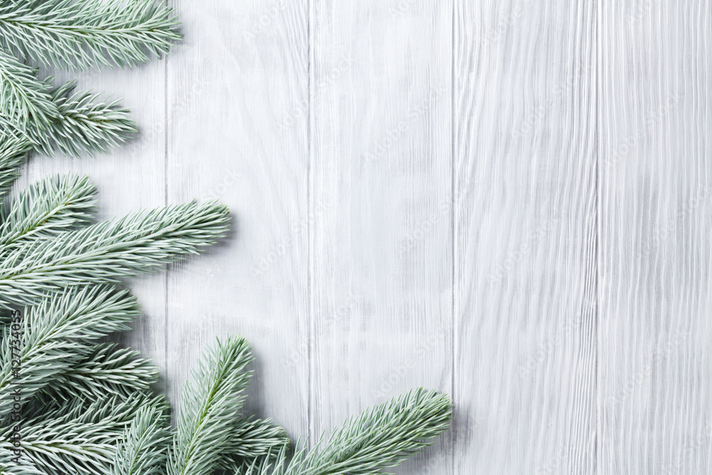 Christmas wooden background with fir tree