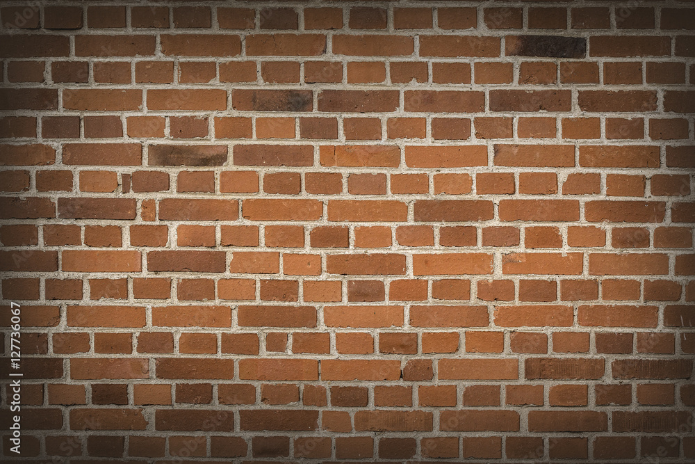 Fototapeta premium old dark brown and red brick wall background,