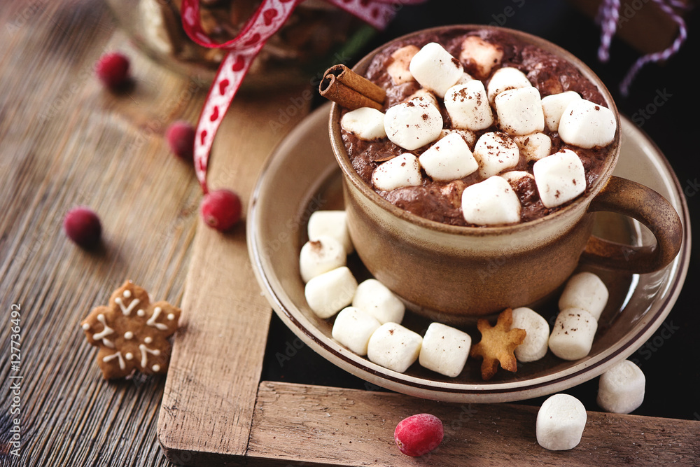 Hot cacao drink with marshmallows, gift box and christmas cookie Hot cacao drink with marshmallows, gift box and christmas cookie