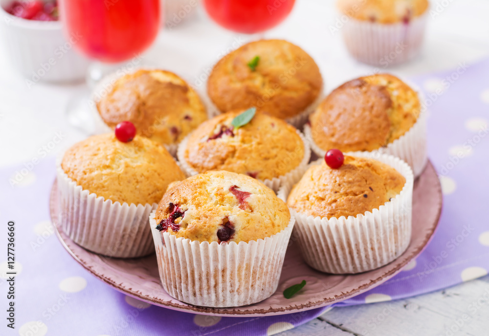 Tasty muffin (cupcake) with cranberries Tasty muffin (cupcake) with cranberries