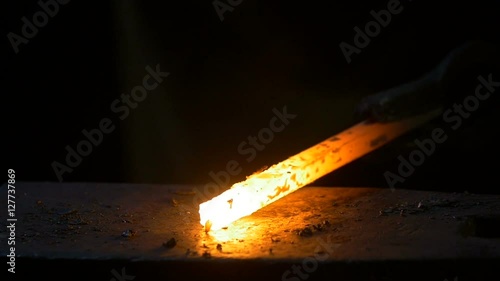 Blow on hot metal close-up