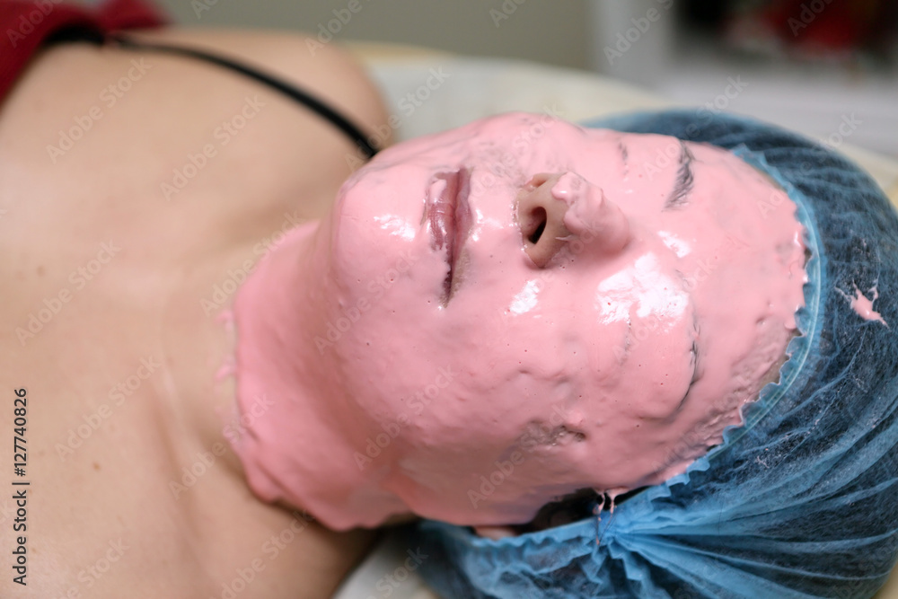 Fototapeta premium Woman with peel off face mask
