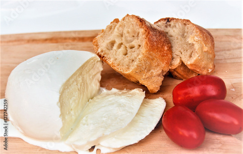 juicy neapolitan mozzarella cheese with tomatoes and bread 