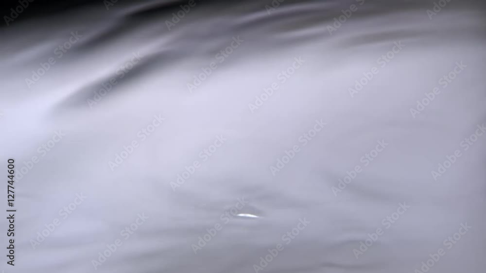 Slo-mo water droplets against white background Slo-mo water droplets against white background
