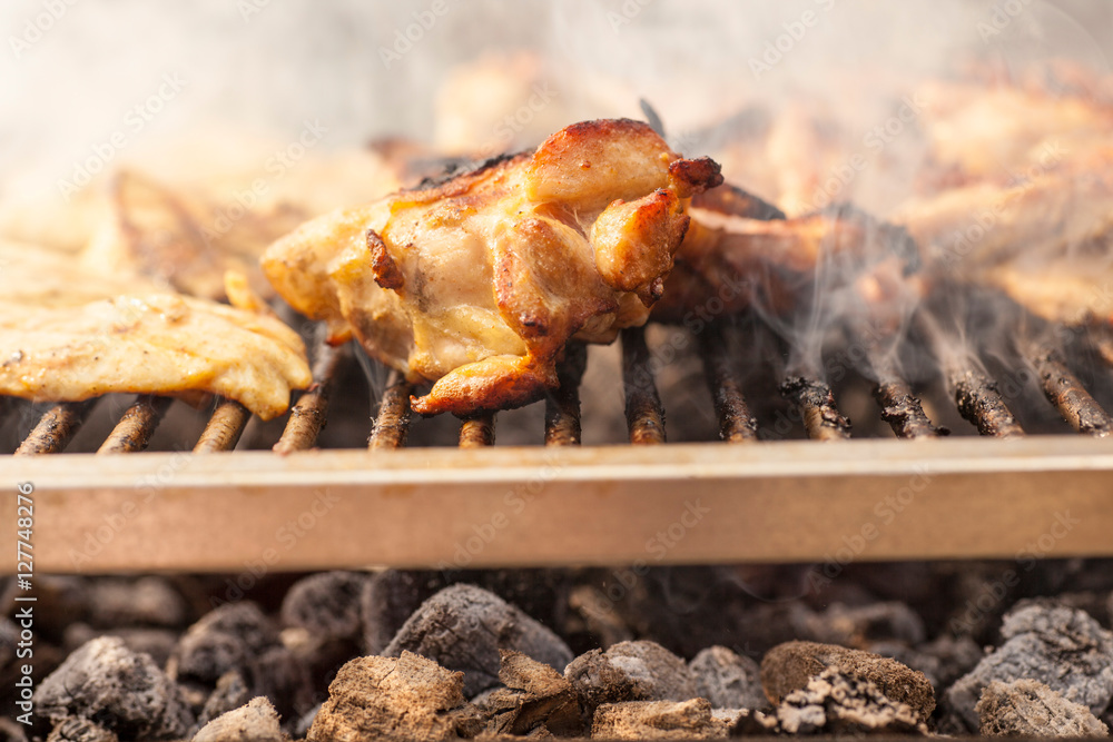 delicious grilled meat over the coals on a barbecue delicious grilled meat over the coals on a barbecue