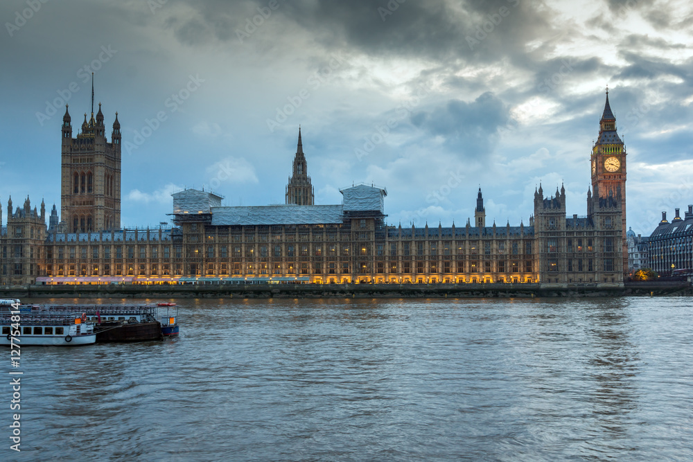 LONDON, ENGLAND - JUNE 16 2016: Sunset view of Houses of Parliament, Westminster palace, London, England, Great Britain