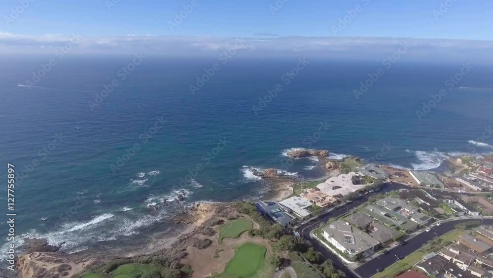 Aerial Panning view of Pelican Hill, Cameo Shores, Shorecliffs, looking toward Newport Beach Harbor entrance, with Balboa Island, Newport Peninsula, and in the distance. Aerial Panning view of Pelican Hill, Cameo Shores, Shorecliffs, looking toward Newport Beach Harbor entrance, with Balboa Island, Newport Peninsula, and in the distance.