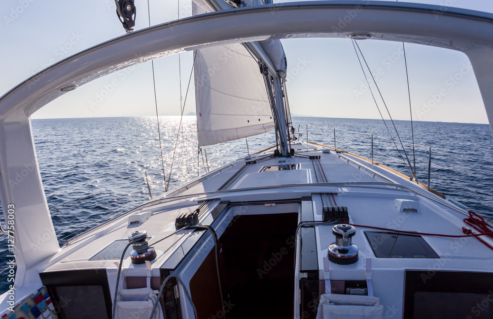 Fototapeta premium sail vessel surfing on the sea