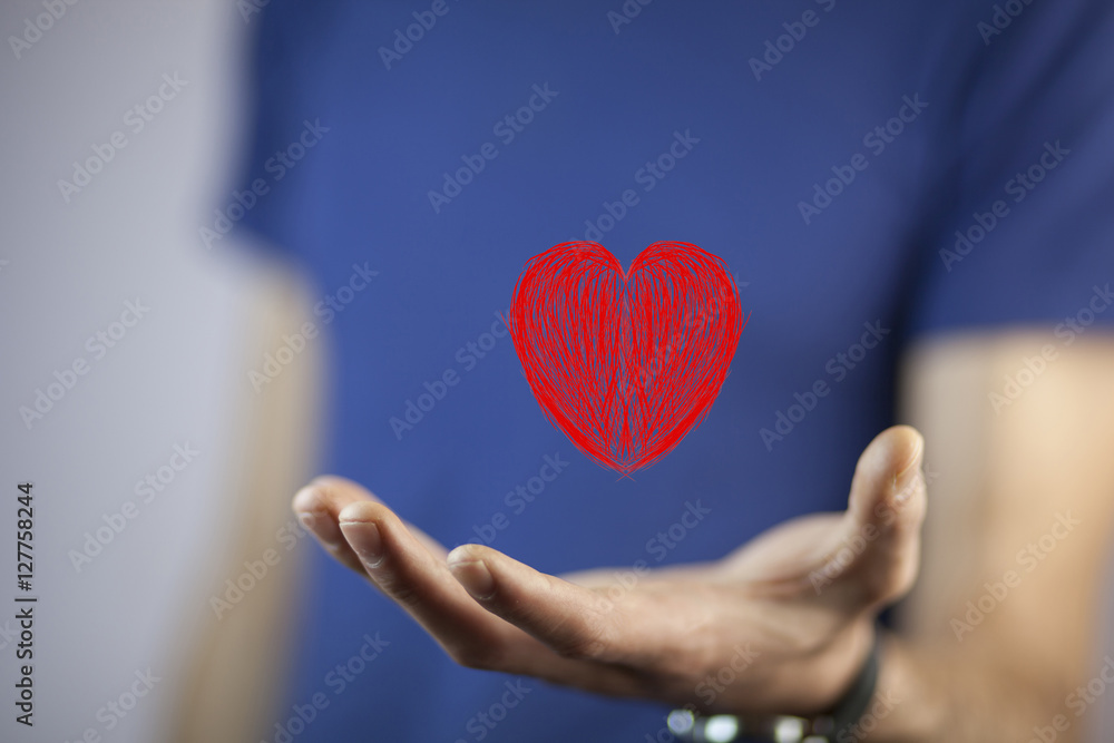 Obraz premium man hand heart