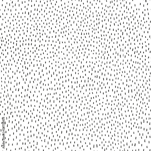 Abstract seamless vector background of handdrawn dots.