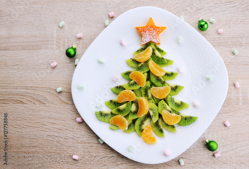 Kiwi Christmas tree - Christmas food background top view blank space for text