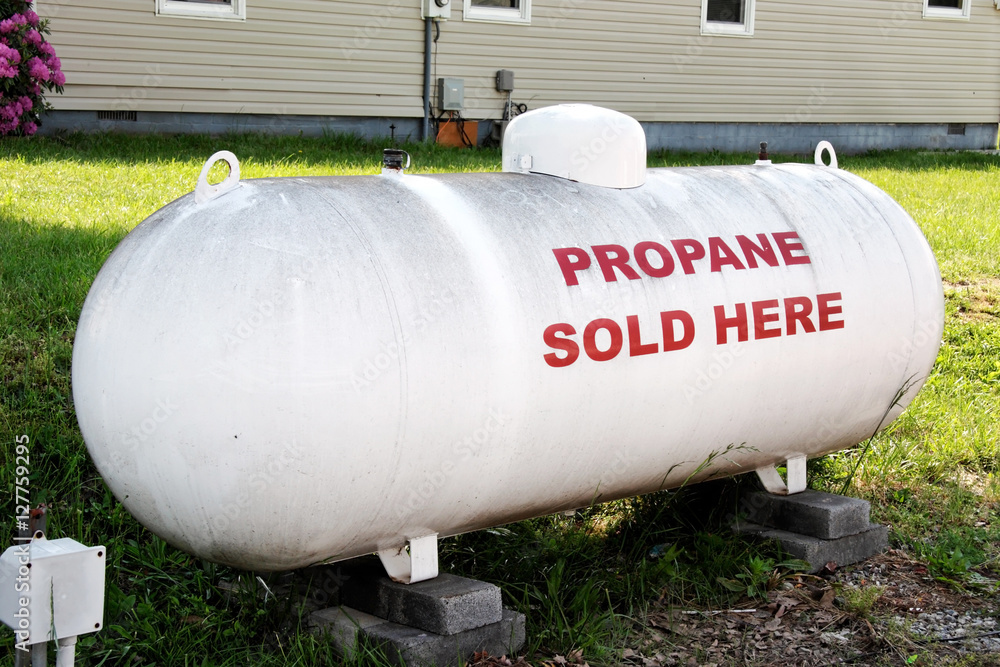Empty propane tank cinder blocks in the shade. Horizontal. Empty propane tank cinder blocks in the shade. Horizontal.