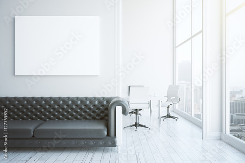 Interior with sofa and poster