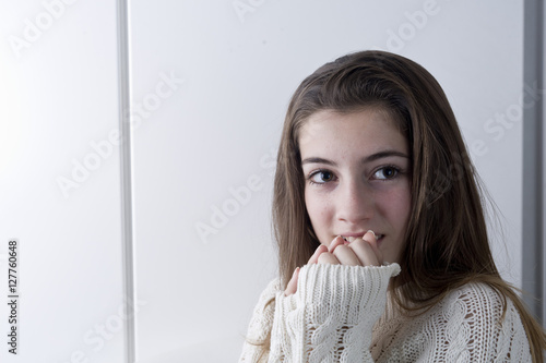 Portrait of adolescent with long chestnut hair