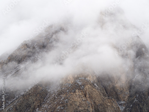 A view of misty mountain peak in Yak Kharka, Annapurna Conservation Area, Nepal