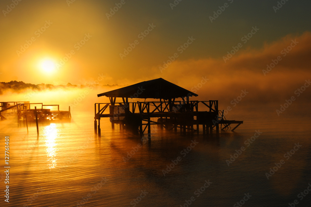 Boat House Silhouetted by Sunshine