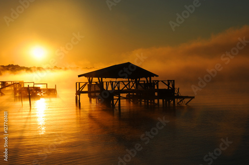 Boat House Silhouetted by Sunshine © bonniemarie