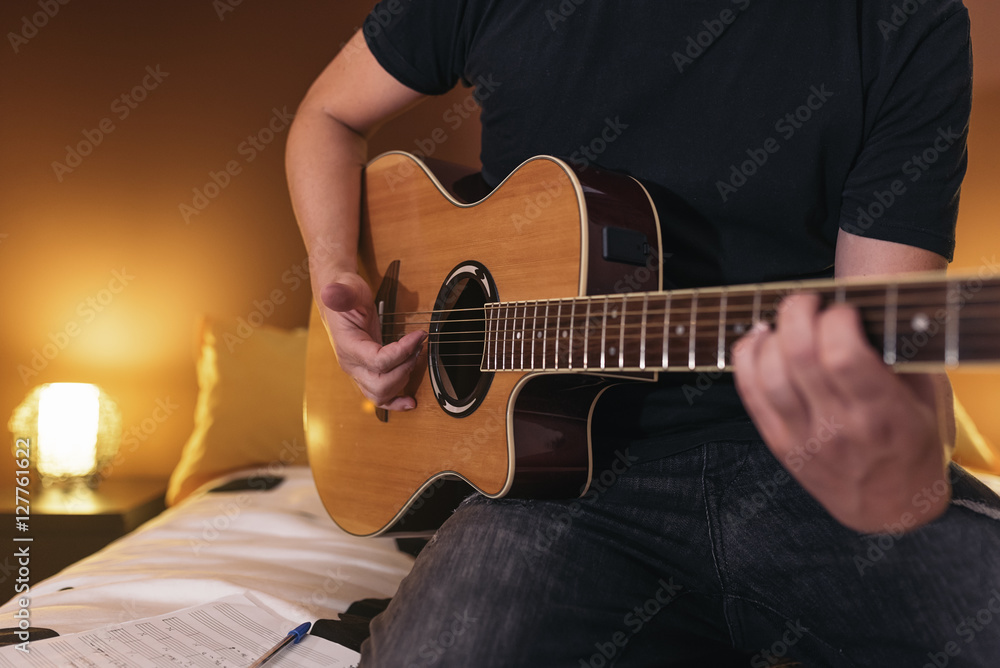 Obraz premium Young man composing music.