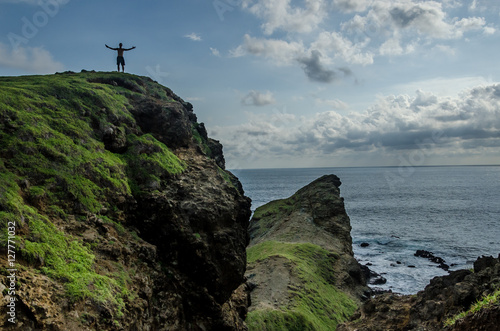 The traveller on the top of the coast, Lombok, Indonesia