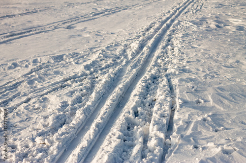 ski trail on the snow background