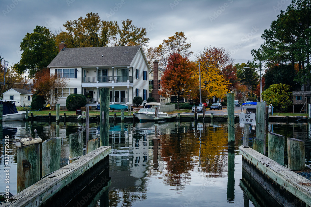 House and autumn color along the harbor in St. Michaels, Marylan