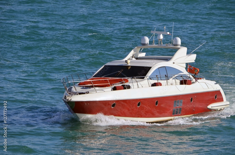 Upscale cabin cruiser on the florida intra-coastal waterway near Miami Beach Upscale cabin cruiser on the florida intra-coastal waterway near Miami Beach