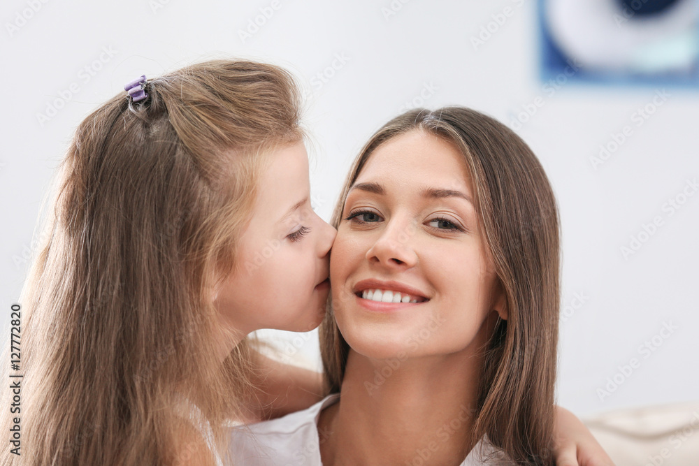 Cute girl with mother at home Cute girl with mother at home