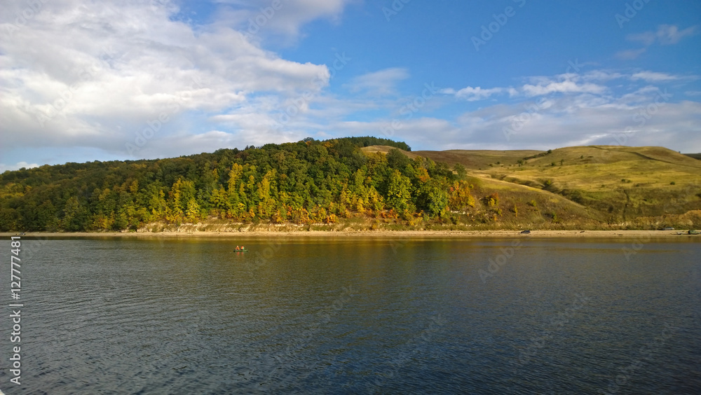 Shore of the great river in autumn Sunny day