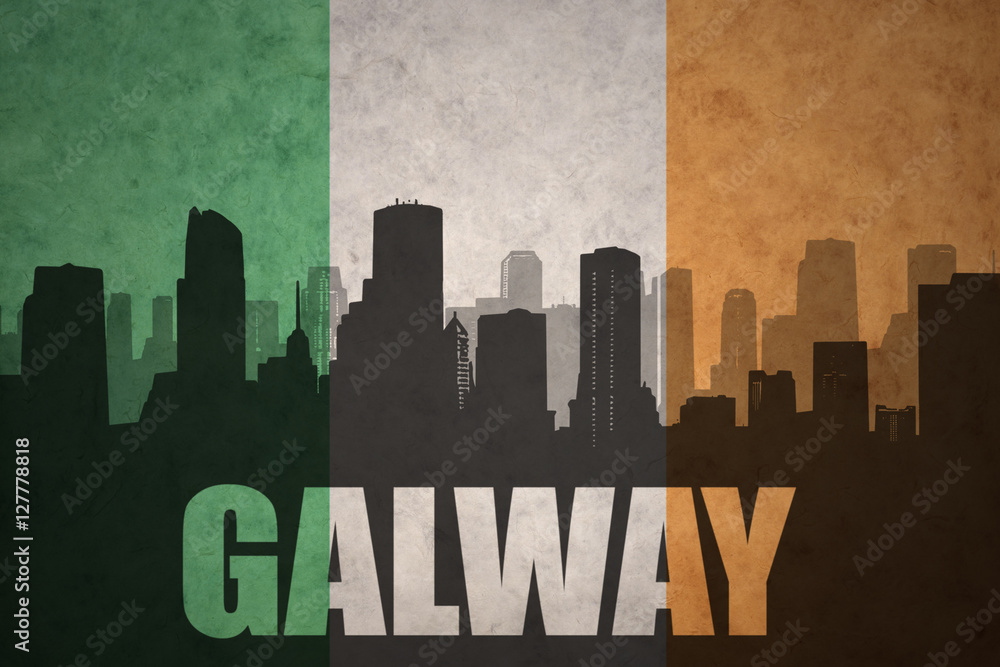 abstract silhouette of the city with text Galway at the vintage irish flag