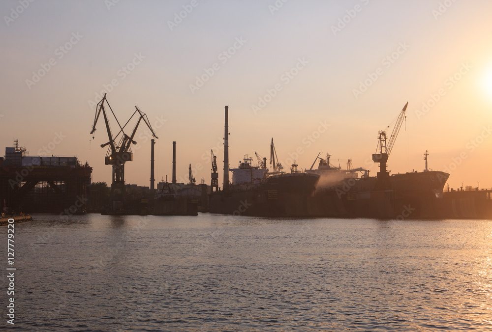 Industrial  view of port at sunset, Gdansk, Poland 

