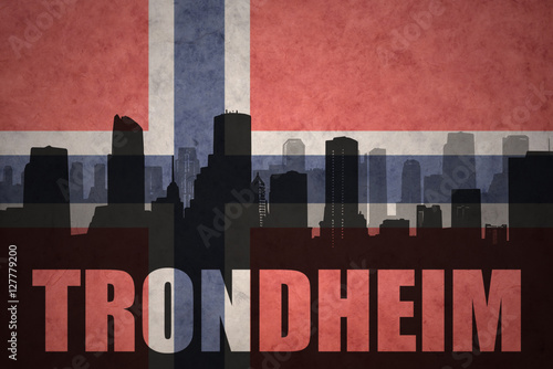 abstract silhouette of the city with text Trondheim at the vintage norwegian flag
