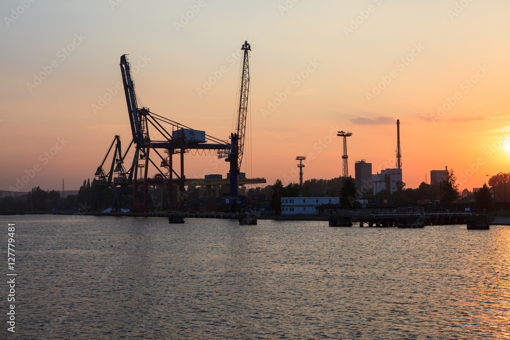 Industrial  view of port at sunset, Gdansk, Poland 

