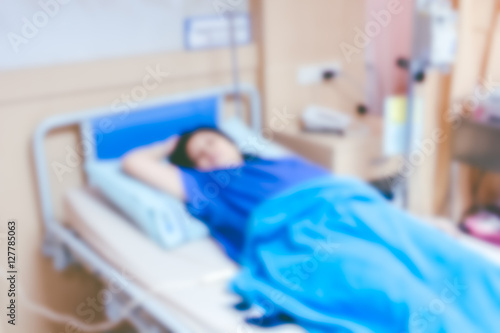 Patient on bed in room hospital blur background