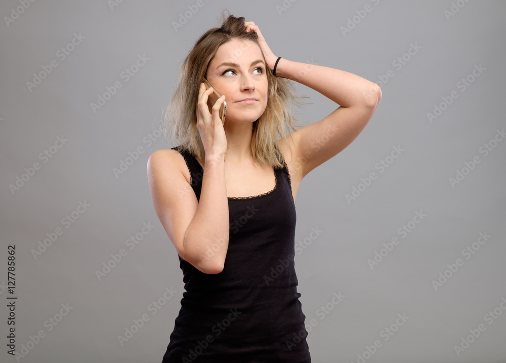 Woman talking mobile phone isolated