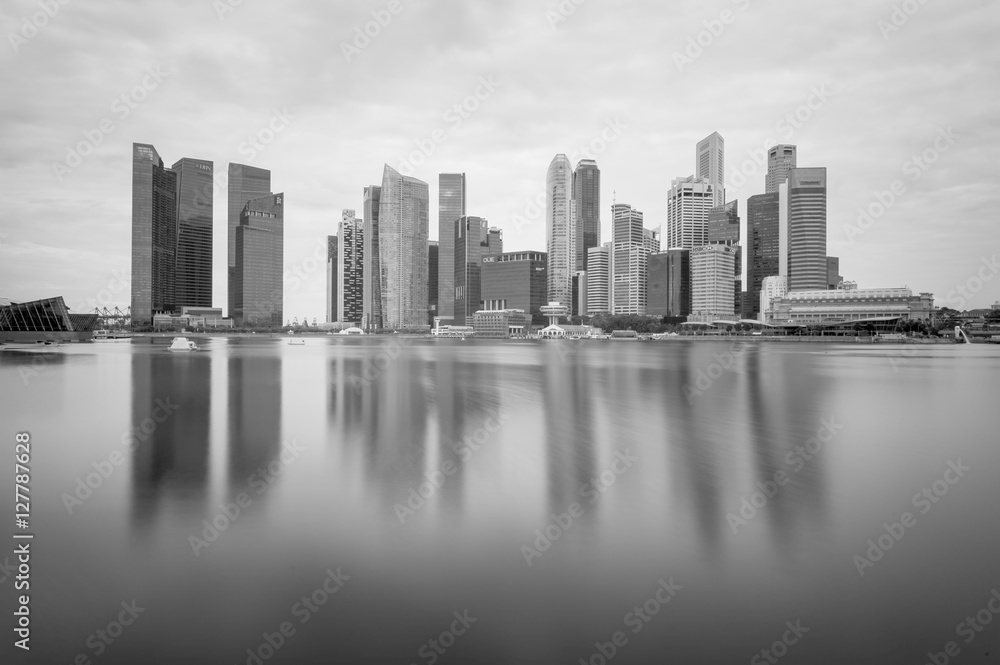MARINA BAY, SINGAPORE - Aug. 18, 2013 : Black and white business city Singapore with water Reflection