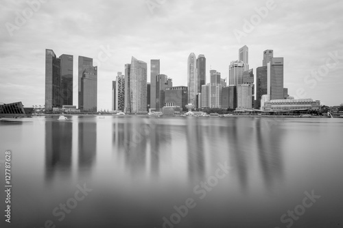 MARINA BAY  SINGAPORE - Aug. 18  2013   Black and white business city Singapore with water Reflection