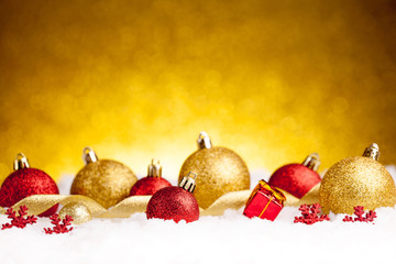 Golden and red christmas ball