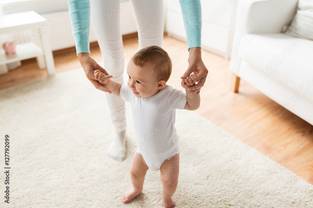 happy baby learning to walk with mother help happy baby learning to walk with mother help