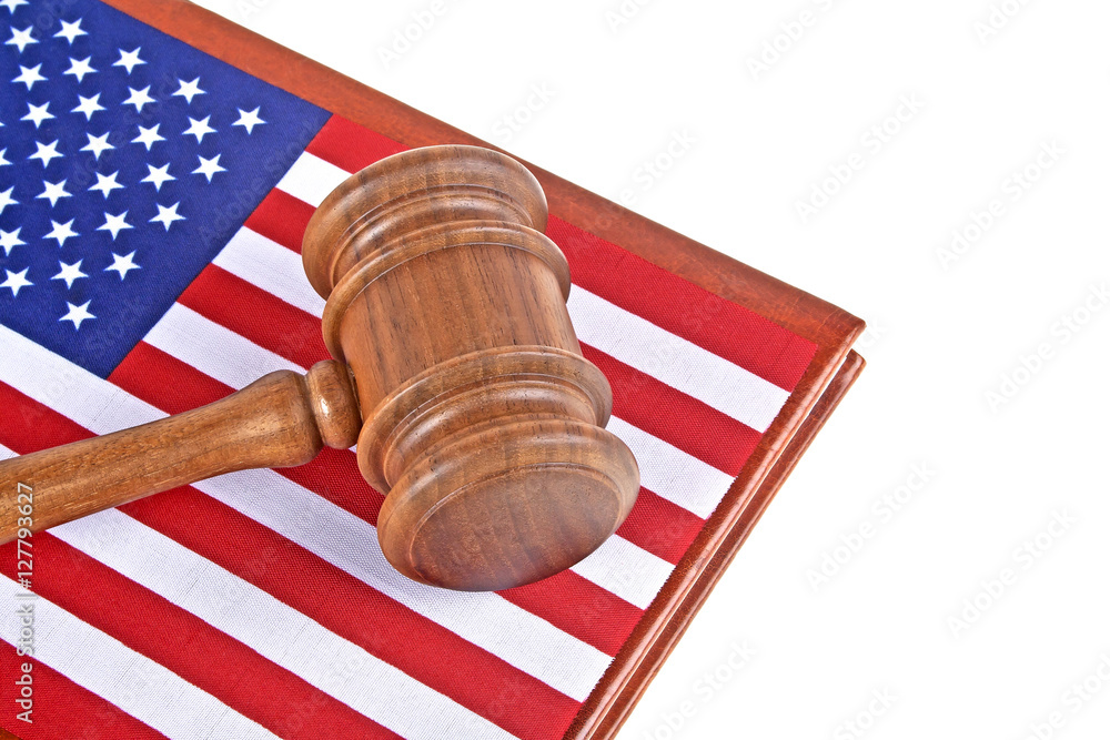 Judge wooden gavel and legal book with usa flag, white backgroun