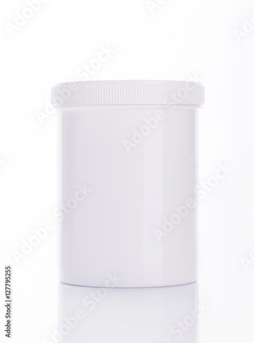 collection of various beauty hygiene containers on white background.
