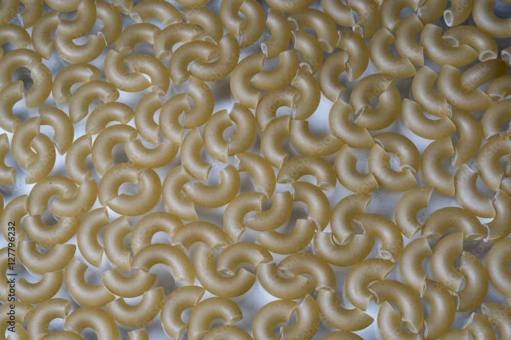 Abstract background of pasta in the shape of a horn