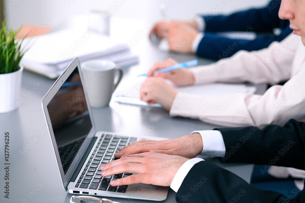 Group of business people working together in office Group of business people working together in office