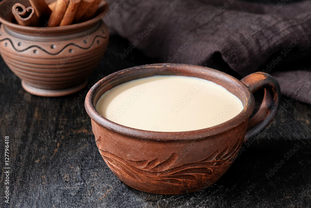 Masala tea chai latte traditional hot Indian sweet milk spiced drink